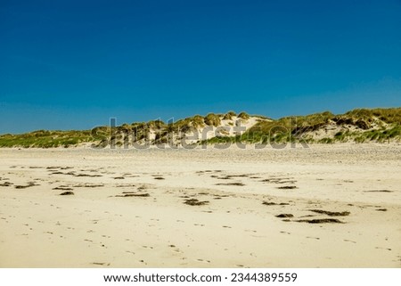 On the road along the kilometres of sandy beach on the Atlantic coast in beautiful Brittany - Plage De Treogat - France