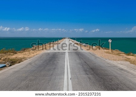 On the road on the scenic Cayo Coco Causeway in Cuba
