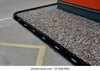 On The Roof Structure Of The Roadway, A Bridge Made Of Concrete Where Curbs With Pebble Barriers Are Formed By Screwed Black Rubber Bumpers With White Reflectors, Traffic, Traffic, Truck