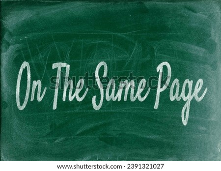 On the same page - Refers to being in agreement or understanding with someone else. Keywords: agreement, understanding, communication.