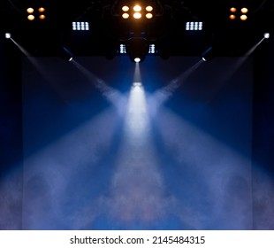 Сoncert on scene theater, stage light with colored spotlights and smoke.