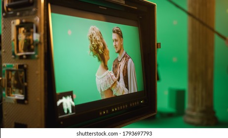 On Set Display Showing: Green Screen Scene With Two Actors Talented Wearing Renaissance Costumes Doing Romantic Drama Dialogue. Film Studio Professional Crew Shooting Historical Costume Drama Movie