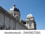 Façade on the south side of the Royal Exhibition Building behind Carlton Gardens in Melbourne, Victoria, Australia. Currently an exhibition venue for various festivals and fairs