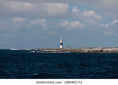 On the southernmost tip of the Aran Islands, the Inisheer Lighthouse guides the southern entrance of Galway Bay.  Inisheer, Aran Islands, County Galway, Ireland.
