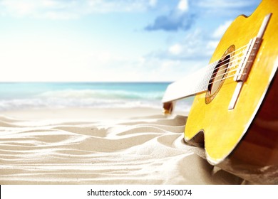 
On A Sunny Beach Guitar And Suitcase