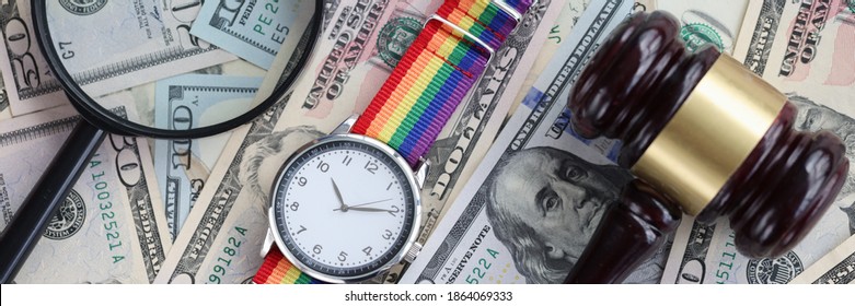 On Table Are American Banknotes Magnifying Glass Lgbt Watch And Wooden Gavel. Sexual Minority Rights Concept