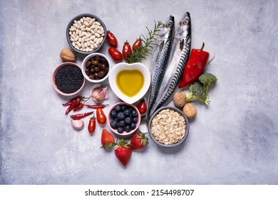 on the textured background, variety of Mediterranean healthy foods based on legumes, fish, vegetables, fruits and grains - Shutterstock ID 2154498707