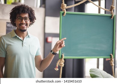  On This Board I Started To Do My Job For The First Time. Young Student Looking At Camera. Space For Copy.