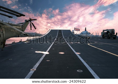 On top of HMS Ark Royal aircraft carrier and flagship of the British Royal Navy at sunset
