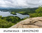 On top of West Rattlesnake Mountain, view of Squam Lake, Sandwich, New Hampshire, USA	