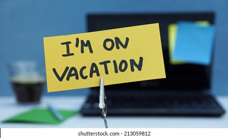 I Am On Vacation Written On A Memo At The Office