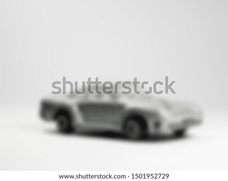 On a white background, it blurs the model car. Used as a photo background performance.