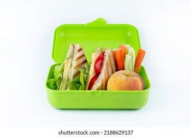 School Lunch Tray With Vegetables Against White Background Closeup