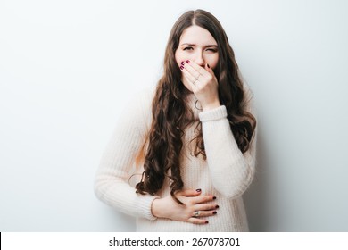 On A White Background A Young Girl With Long Hair Nausea