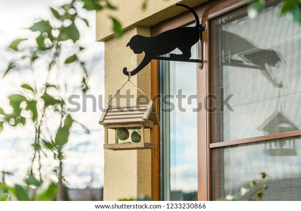 On Window Frame Mounted Bird Feeder Stock Photo Edit Now 1233230866