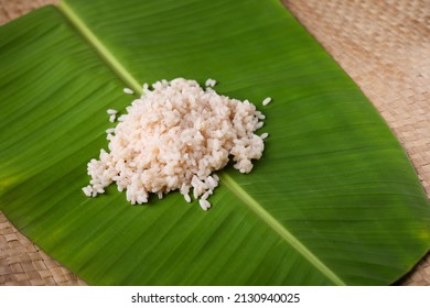 Onam sadhya, Kerala boiled rice, served in banana leaf for Kerala Indian festival with curries Sambar, Avial, Thoran, Papadum, Payasam, Banana, Yogurt or Buttermilk, banana chips