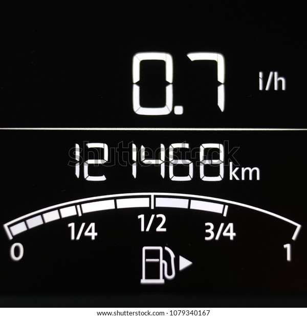 on-Board\
car\'s computer display showing mileage and\
fuel