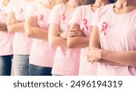 Oncology Prevention. Group Of Unrecognizable Multiracial Ladies In Pink Cancer Awareness T-Shirts Standing Posing Over White Background. Panorama, Shallow Depth