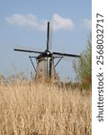 One of the 19 windmills at Kinderdijk in the Netherlands. Built about 1740, this is the largest concentration of windmills in the Netherlands, a UNESCO world heritage site. 