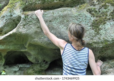 One Active Woman Bouldering Outside In Bavaria, Germany