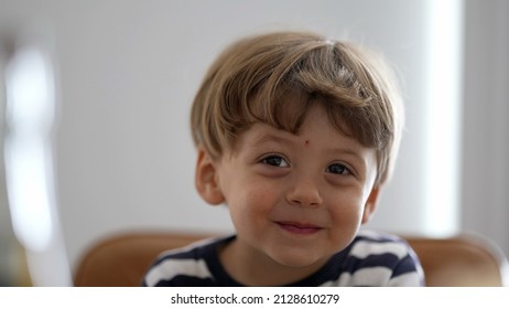 One adorable child portrait face smiling cute small boy