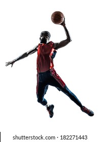 one african man basketball player jumping dunking in silhouette isolated white background