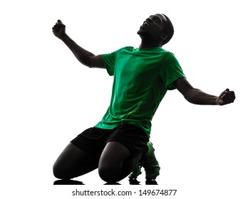 one african man soccer player celebrating victory green jersey in silhouette  on white background - Powered by Shutterstock