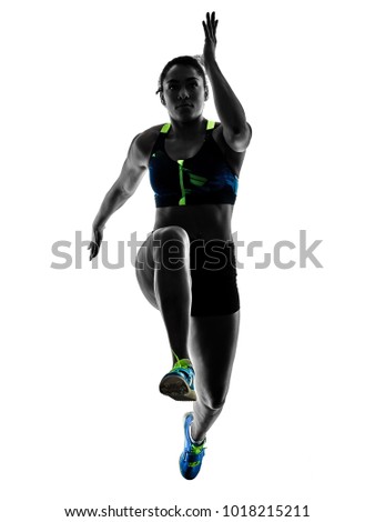 Similar – One young middle age athletic, woman training, exercising with fitness jumping rope over dark background, full length front view, looking at camera