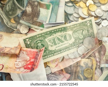 One American Dollar Bill Among Many World Currencies, Cash, Money Exchange Business, Finance, Economy, Nobody. Investment, Currency Exchanging, Banking, Donations Abstract Concept, No People