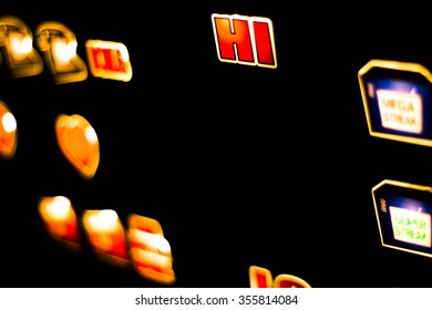 One Arm Bandit Slot Machine In Casino At Night Photograph.