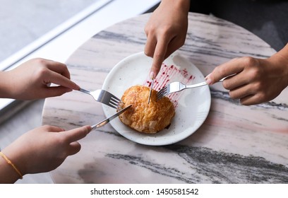 One Asian Teenager Couple Start Dating By Going To Coffee Shop Near University Spend Almost Three Hours Talking Ordering Chocolate Croissant With Raspberry Jam For Sharing And Waiting For Two Drinks. 