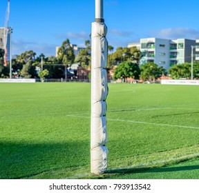 One Australian Football Goal Post Wrapped With Protective Padding In A Football Oval At Arden Street Oval, Melbourne, Australia