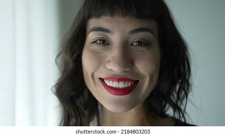 One beautiful hispanic girl portrait smiling at camera. Closeup face of a happy South American woman
