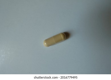 One Beige Capsule Of Milk Thistle Extract From Above