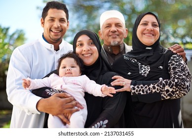 One Big Happy Family. A Muslim Family Enjoying A Day Outside.