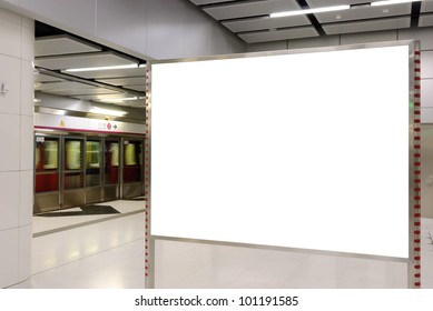 One big horizontal / landscape orientation blank billboard with train platform background - Shutterstock ID 101191585