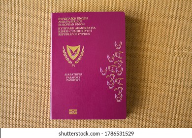 One biometric Cypriot passport. "Republic of Cyprus passport" written on