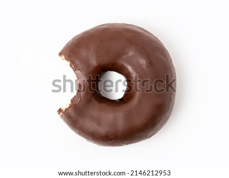 One bite missing of chocolate donut on white background.