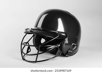 One black baseball helmet on white background - Powered by Shutterstock