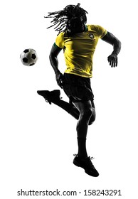 One Black Brazilian Soccer Football Player Man In Silhouette Studio  On White Background