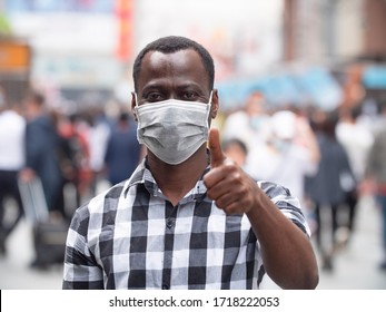 One Black Man Wear Mask Looking At Camera Smile Thumbs Up Happy Man With Mask In The City Street 