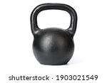 one black metal kettlebell for sports on a white isolated background