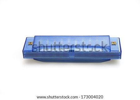 One blue harmonica on a white background
