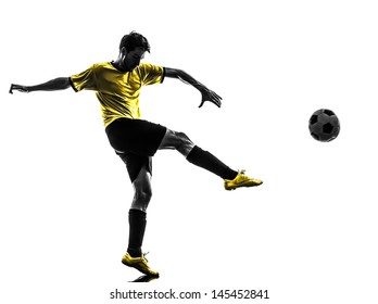 one brazilian soccer football player young man kicking in silhouette studio  on white background