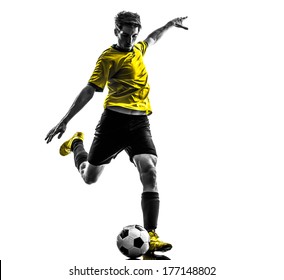 one brazilian soccer football player young man kicking in silhouette studio on white background