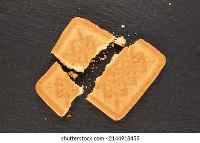 One Broken Sugar Cookie On A Slate Stone, Macro, Top View.