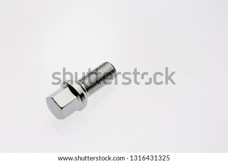 One car wheel bolts isolated on white background with copyspase - Image