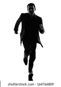 One Caucasian Business Man Running In Silhouette  On White Background