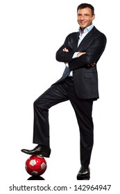 One Caucasian Business Man Standing Arms Crossed Foot On Soccer Ball In Studio Isolated On White Background