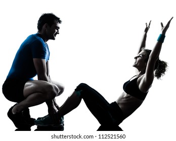 one caucasian couple man woman personal trainer coach exercising abdominal silhouette studio isolated on white background - Powered by Shutterstock